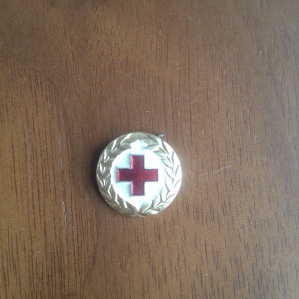 Nostalgic collection of old objects 80 s Red Cross badge badge collection bag really old