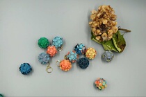 Handmade leather knife die with embroidered ball pendant knife die