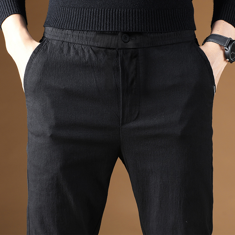 Autumn black casual pants men's Korean version of the trend of slim feet trousers all-match trousers elastic spring and autumn tide brand