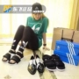 Adidas ADILETTE SANDAL quai velcro màu đen và trắng đi biển dép sandal nam hàng hiệu