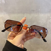 Japans new trampoline sunglasses female tide European and American small face small frame tea color anti-UV driving sunglasses male