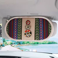 Компакт -диск на солнцезащите