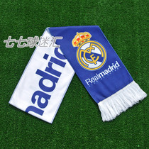 Real Madrid fan supplies souvenirs surrounding Real Madrid fan scarves