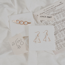 White ceramic poop coaster aromatherapy mat hand photo props Jewelry earrings jewelry decoration photography background