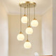 All-Copper Staircase Chandelier for Duplex Villa, Open-Air Living Room, Vertical Hollow American Minimalist French Cream Lighting Fixtures