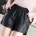 Mùa thu và mùa đông mới thon gọn Quần short da PU mỏng Quần nữ sinh viên Hàn Quốc quần thun eo rộng chân quần da nữ quần short ren nữ đẹp Quần short