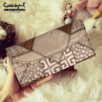 This is a niche design for women and a bestseller for moms. It's a long, GJ-feel, large-capacity genuine leather 2024 new women's wallet