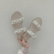 Fairy Wind slippers female holiday windy 2021 New flat-bottomed pearl lined with summer Korean version net red sandals