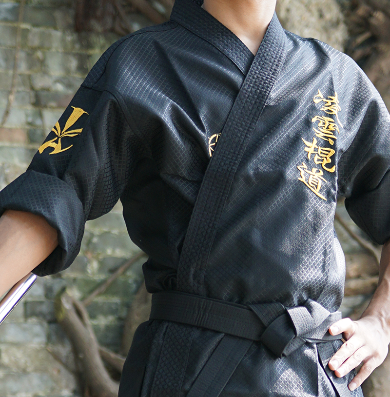 Lingyun stick Road performance suit nunchaku black training suit coach uniform golden face-Dragon model