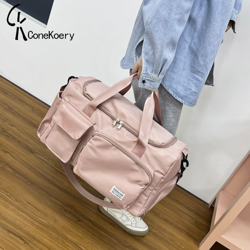 French travel bag female hand large capacity male waterproof light to be produced short walk out tourist bag student luggage bag