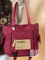 Бордовая сумка через плечо