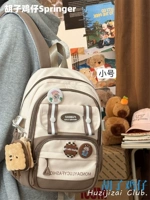 Маленький коричневый кошелек, надевается на плечо