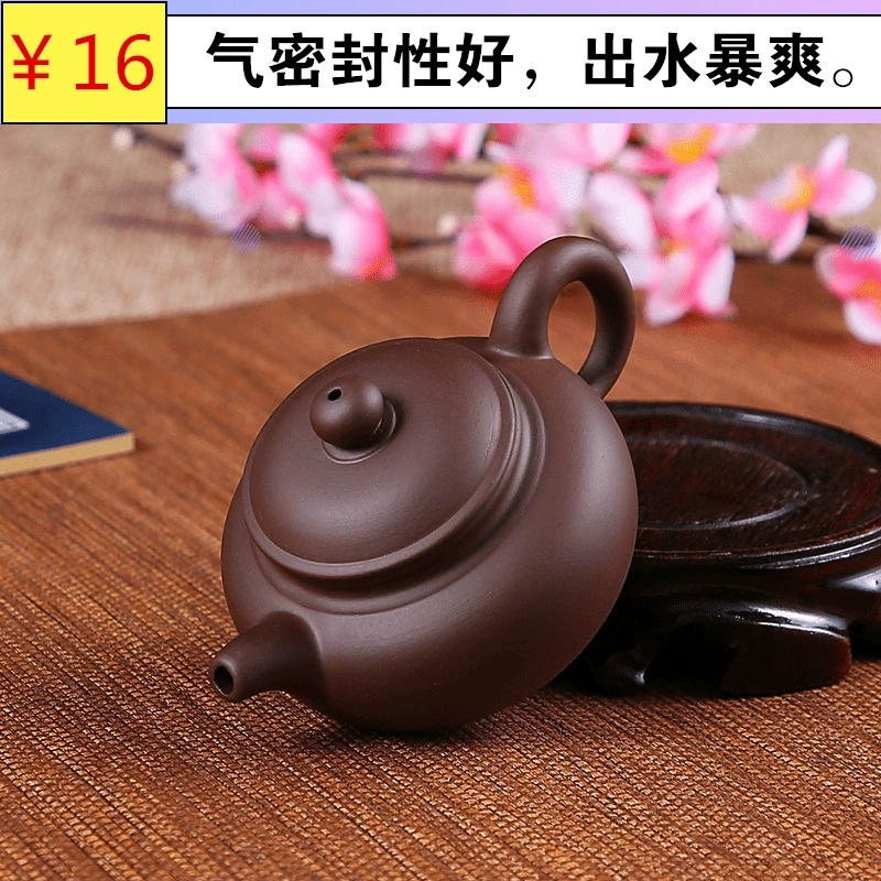 Ấm trà ấm trà nổi tiếng làm bằng tay ấm trà gốm sứ kung fu bộ bóng lỗ lọc bộ ấm trà - Trà sứ
