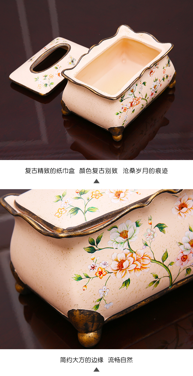 American pastoral ceramic tissue box European sitting room adornment is placed between example creative painting of flowers and tea table smoke box