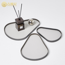 Modern minimalist home living room tea table tray containing key jewellery stainless steel entry into the house light and luxurious swing piece