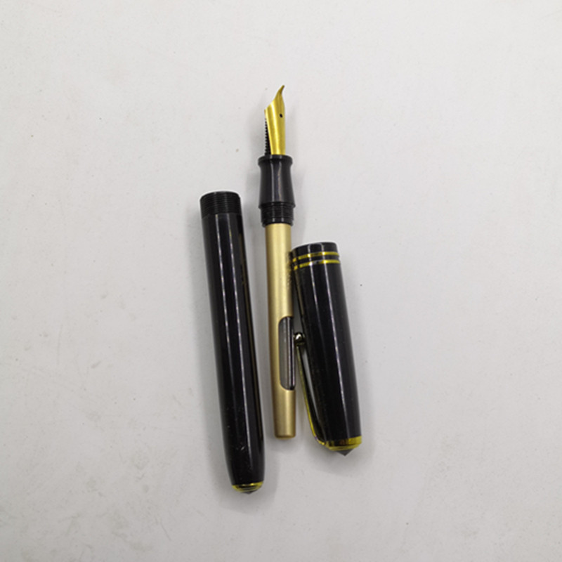 Ручка перьевая 老库存黑龙江28美工钢笔黄尖拧帽经典老钢笔1991年产品一支的价格