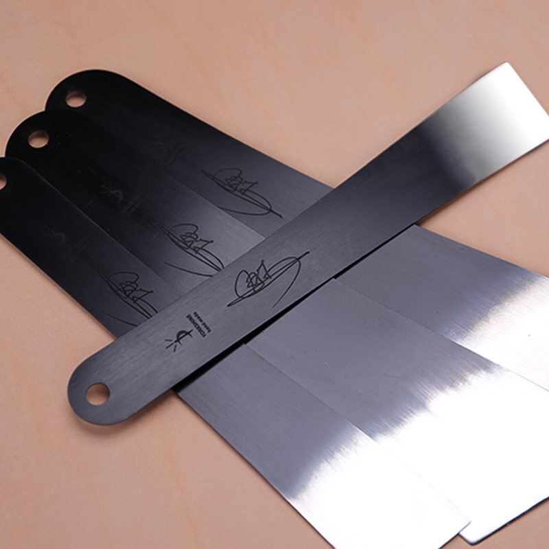 Metal upper negatives glued to glue scraped rubber sheets handmade leather with upper negatives artisan hand made for the month of the day