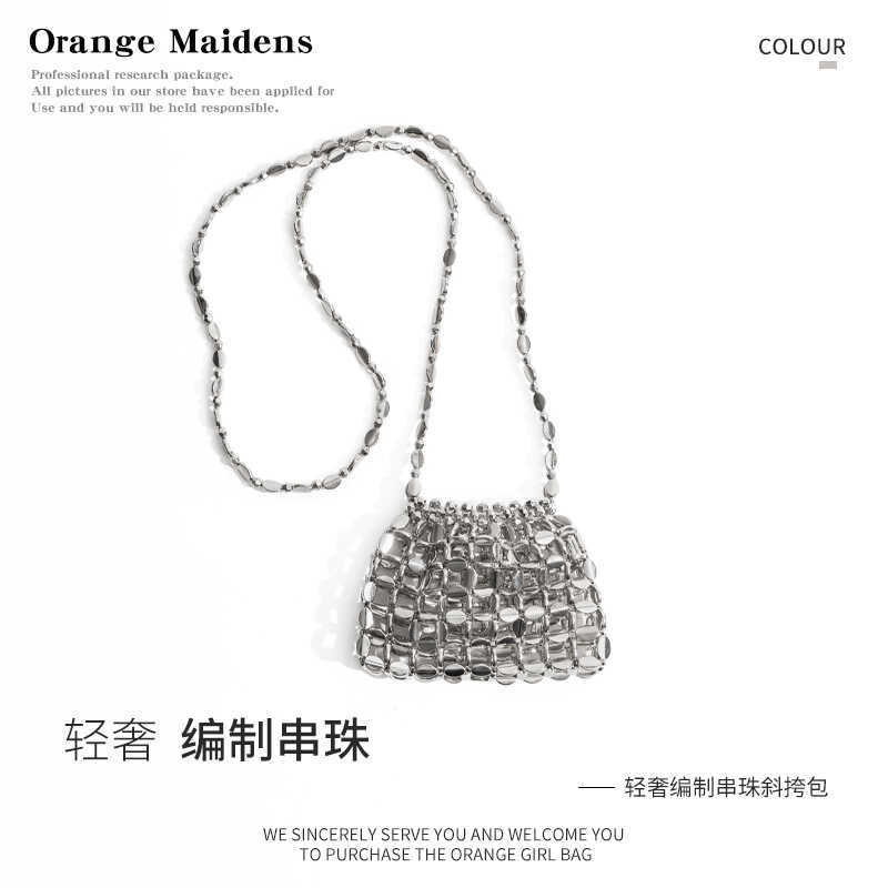 Orange Girl Niche Design Metallic Silver Hollow Mini Bag Decoration New Woven Earphone Crossbody Small Bag