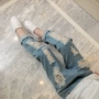 Quần jeans lỗ nữ mùa thu 2018 mới dành cho trẻ em Hàn Quốc quần âu mùa xuân và mùa thu mẫu quần bé gái quần áo trẻ em 10 tuổi