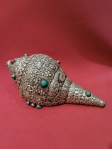 Wisdom and Compassion Buddha Destiny a silver-covered conch inlaid with jewels a 30cm conch offering as an offering