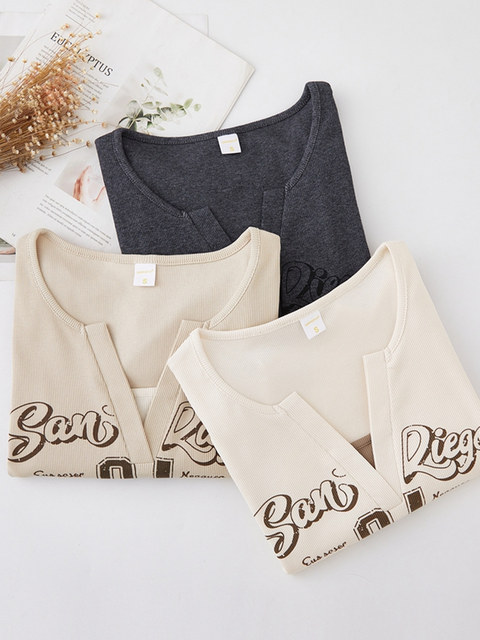 Distressed Letter Print Color-Blocked Fake Two-Piece Women's 2026 Spring New American Style Spicy Girl V-Neck Long-Sleeve T-Shirt Top