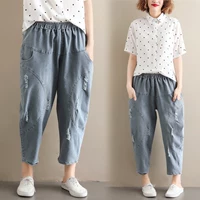 Mùa hè 2019 quần mới size lớn quần thun nữ có lỗ rửa quần cũ quần jeans harem rộng - Quần jean shop quần áo nữ