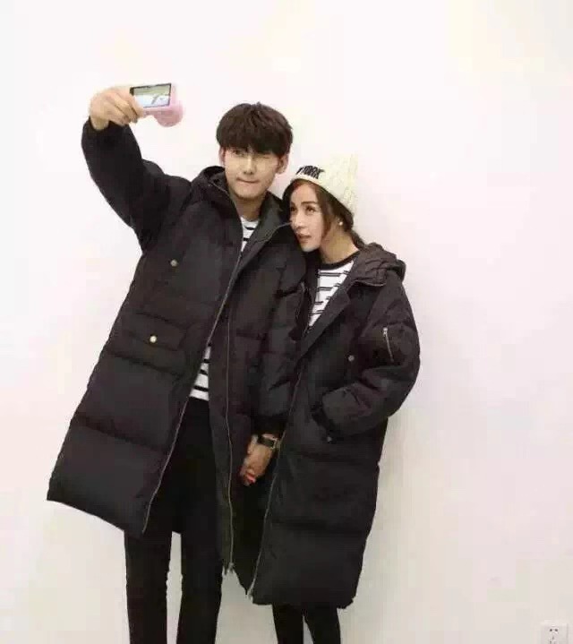 Korean couple down jacket women's long version loose thickened Korean version of white duck down