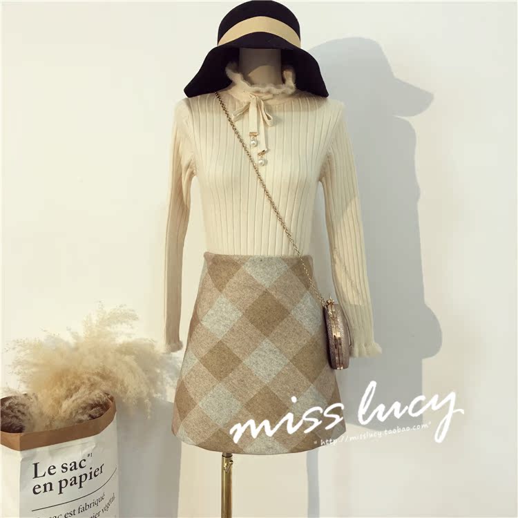 Nữ mùa thu 2018 mới Hồng Kông hương vị retro chic cao eo len váy một từ váy là gói mỏng hip lưới váy chân váy midi xếp ly