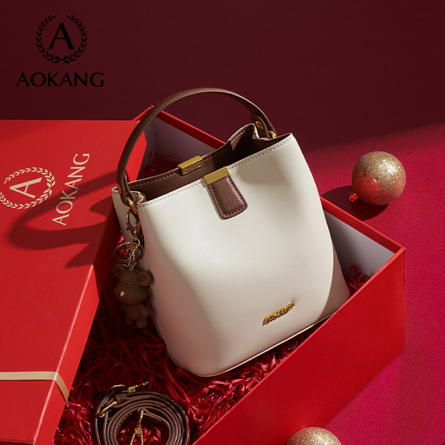 Aokang Bag 2024 ໃຫມ່ຂອງແມ່ຍິງ Bag ຄວາມອາດສາມາດຂະຫນາດໃຫຍ່ Crossbody Bag 520 Gift Bucket Bag ຫນັງແທ້ Portable Commuting Bag