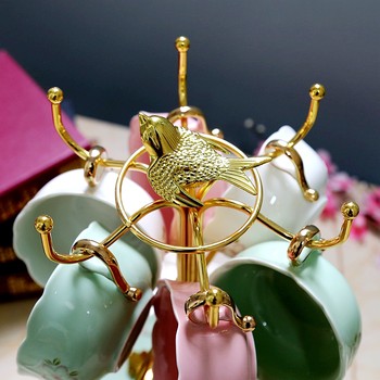 British gold-plated bird creative upside down drain storage rack