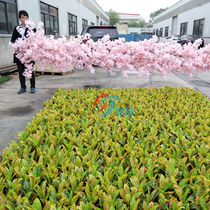 Simulation of green plants sprinkled with golden banyan discolored wood Simulation of cherry blossoms at the door of the commercial street Meichen flower box flower arrangement