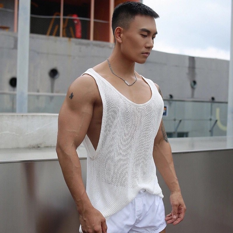 The Latest Summer Knitted Vest for Men with Large Hollow-Out Design, Breathable, Sporty, Fashionable, and Unique Fitness Vest for Men The Latest Summer Knitted Vest for Men with Large Hollow-Out Design, Breathable, Sporty, Fashionable, and Unique Fitness Vest for Men