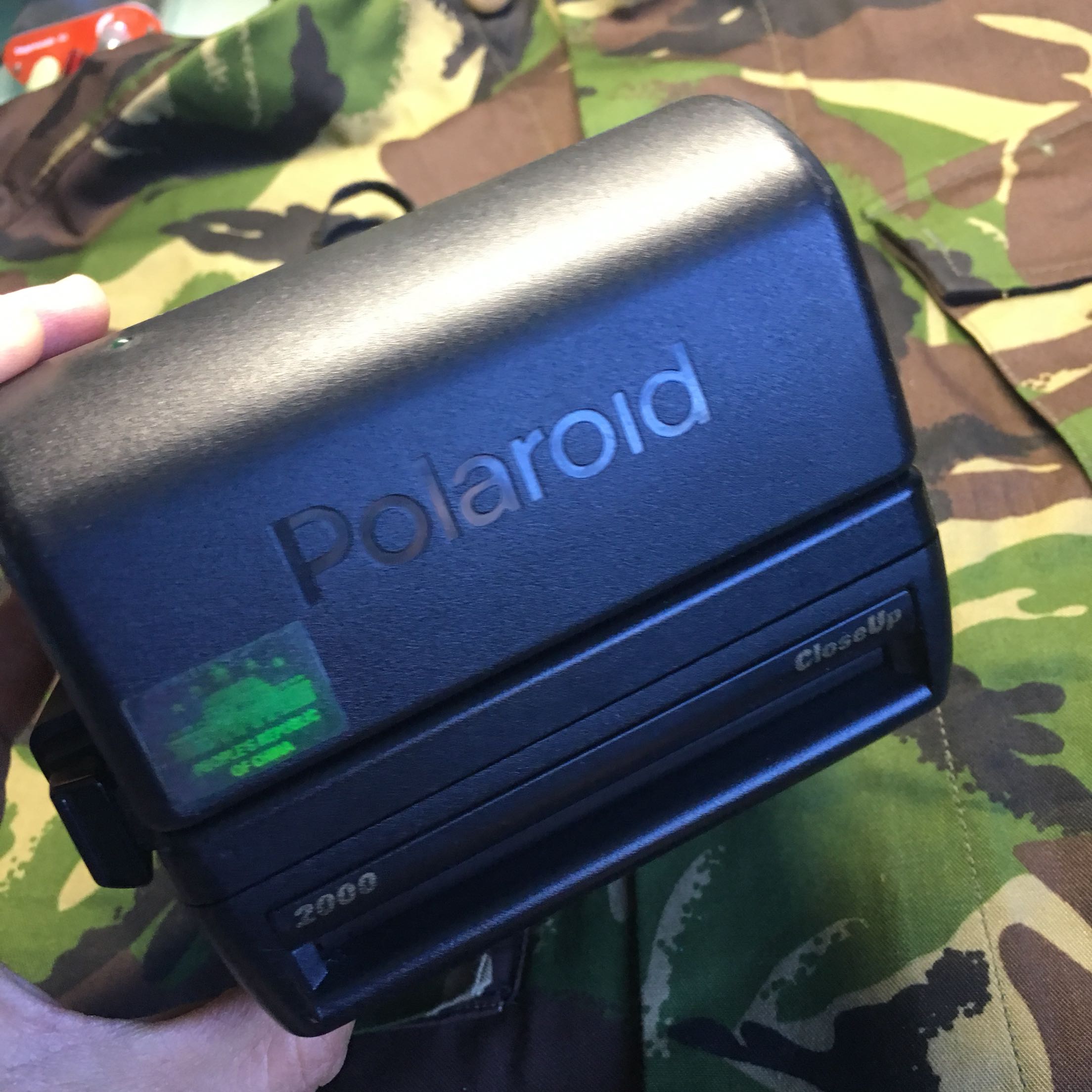 Polaroid's new 2000 Polaroid camera is in good condition and functions normally and is ready to use. Storage number 765