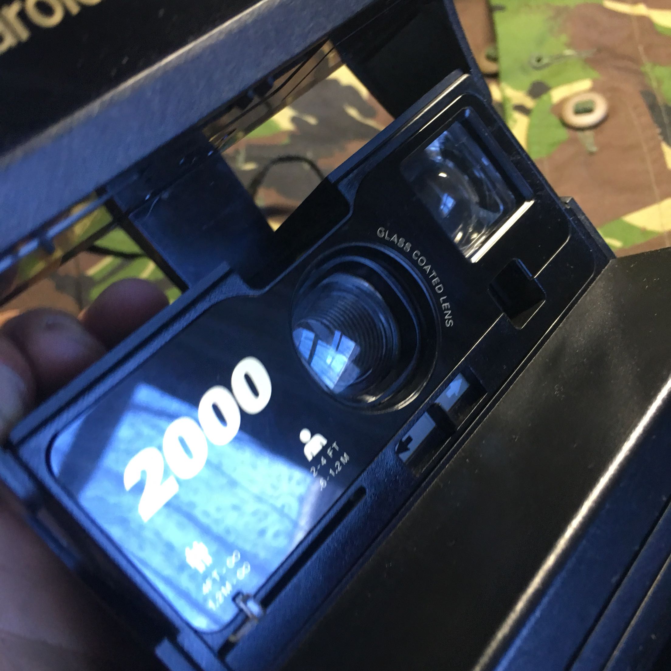 Polaroid's new 2000 Polaroid camera is in good condition and functions normally and is ready to use. Storage number 765
