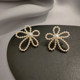 Pearl flower earrings 2022 new trendy women's earrings small crowd simple and versatile design cold style earrings