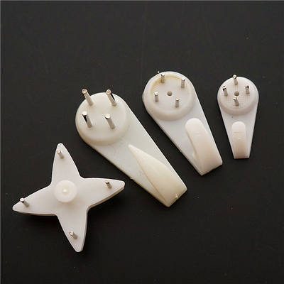 The four types of hooks can be used for hanging photo frames, clocks, Chinese knots, etc