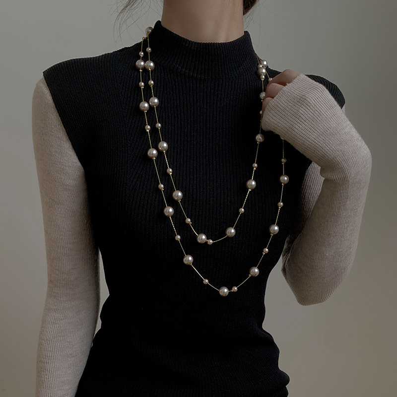 Korean pearl sweater chain female long version 2022 new autumn and winter high-end atmospheric necklace accessories simple temperament trend