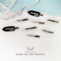 Набор из восьми заколок-звездочек со стразами