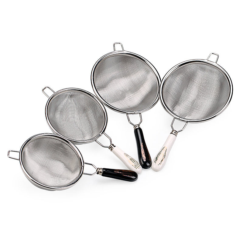 Japanese 304 stainless steel tea leakage Tea filter Filter Creative ceramic handle Kung fu tea ceramic accessories