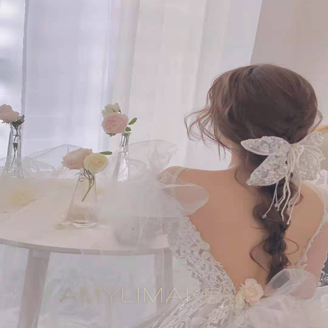 Korean-style bridal bow headwear Internet celebrity street photography Pearl tassel hairpin Photo studio travel photography and makeup wedding accessories