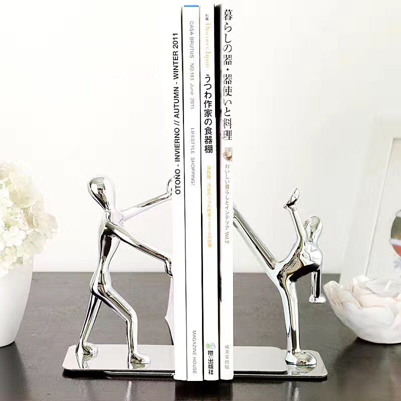 Creative Kung fu book stand Clip book holder Book by European Stainless steel humanoid bookshelf Gift comic book stand stand bookshelf hand push