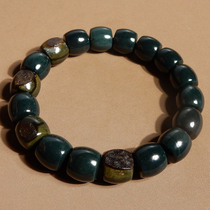 Shocking dialect Hetian jade Xinjiang black green warm and delicate rust red leather with pores 12mm old style bead bracelet