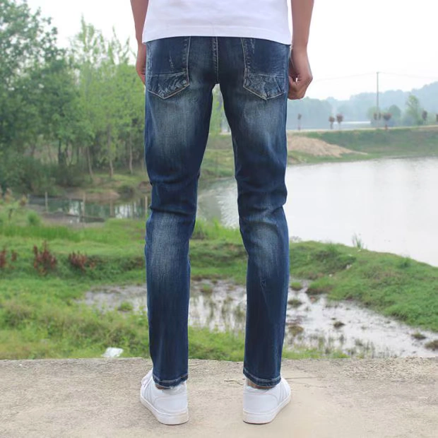 Thẻ nam thân hình ở eo thấp chân nhỏ quần jeans lỗ khoét quần dài xu hướng trẻ trung 2019 - Quần jean