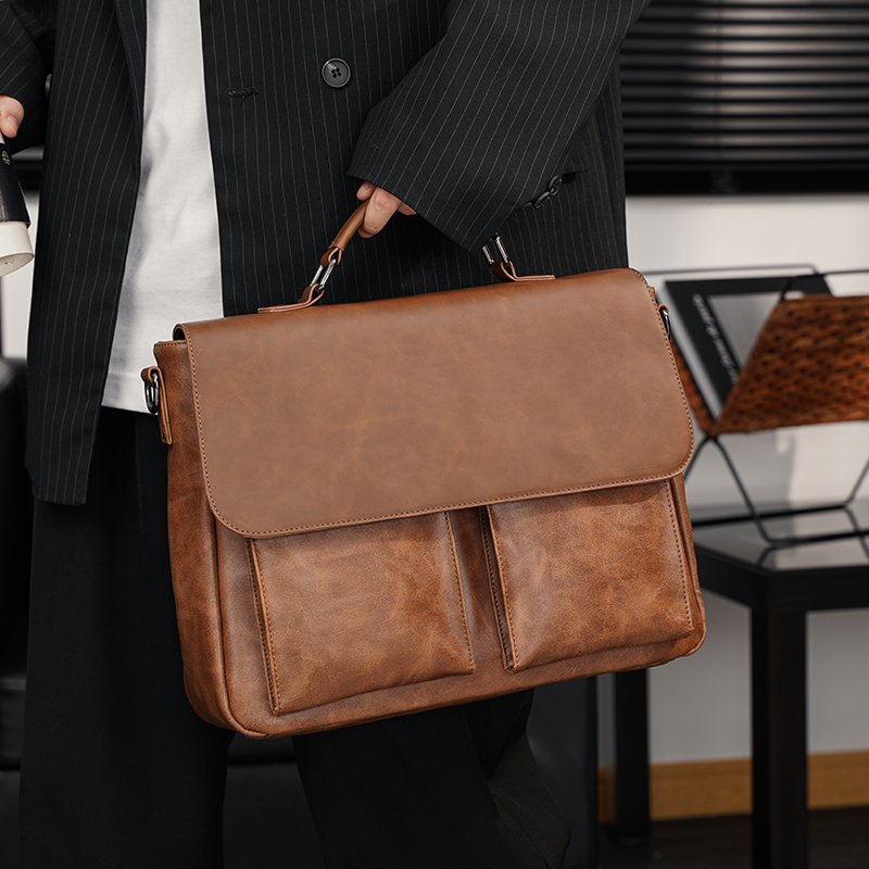 Hong Kong duty-free men's bag new retro handbag business briefcase Korean casual shoulder bag messenger bag