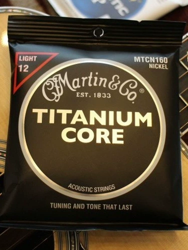 Martin Strings Аутентичные народные деревянные гитарные аксессуары MTCN160 Титановый сплав черный воин Martin String Line Full Set Set