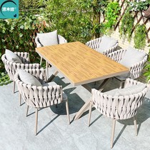 Outdoor balcony leisure table and chairs courtyard outdoor terrace anti-corrosion wood modern simple aluminum plastic wood homestay table and chair combination