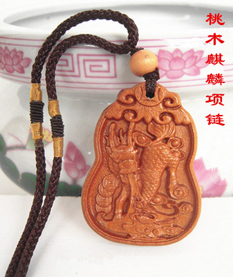 Unicorn pendant men's and women's peach wood necklace safe pendant wood carving wear lucky mascot creative gift