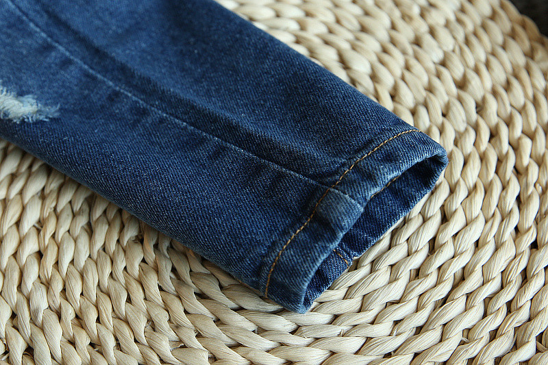 Xuân 2018 mới của các cô gái Hàn Quốc thời trang quần jeans thêu hoa quả dại quần bò đẹp cho bé