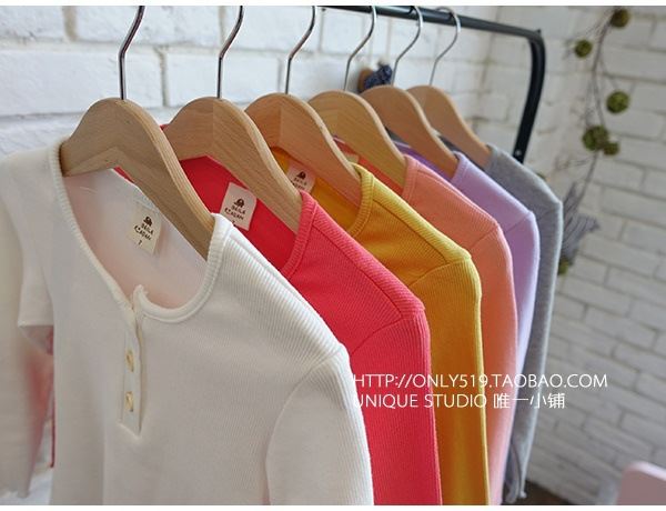 Phiên bản Hàn Quốc của mùa xuân và mùa đông và quần áo trẻ em bằng gỗ mới bằng tai gái bằng vải cotton áo thun dài tay màu kẹo áo sơ mi cửa hàng quần áo trẻ em