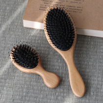 The process at the beginning of the zhu zong mao cushion comb airbag massage comb size children comb hair anti-hair loss Shunfa mu shu zi